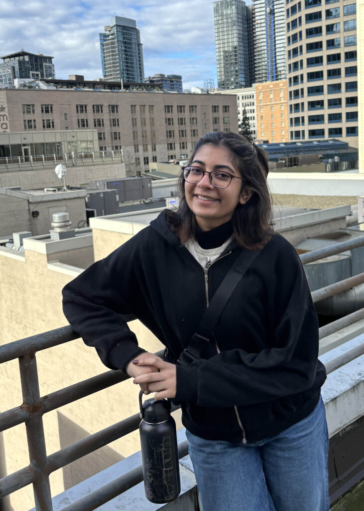 Image of Hadiya Amjad with a city background