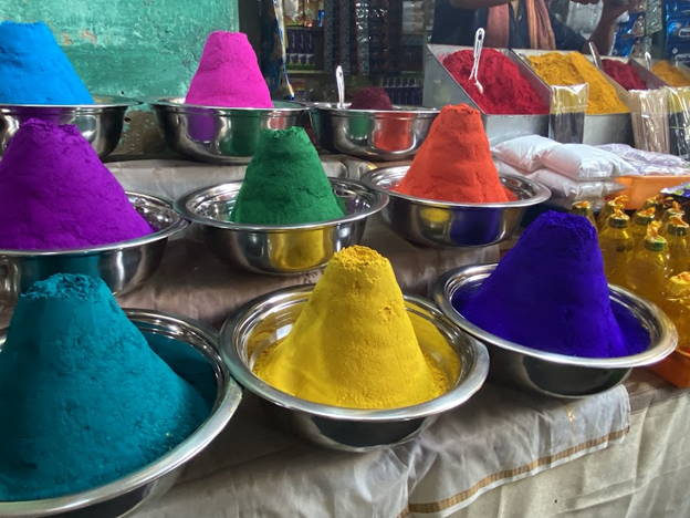 Colorful powders on display at a street market