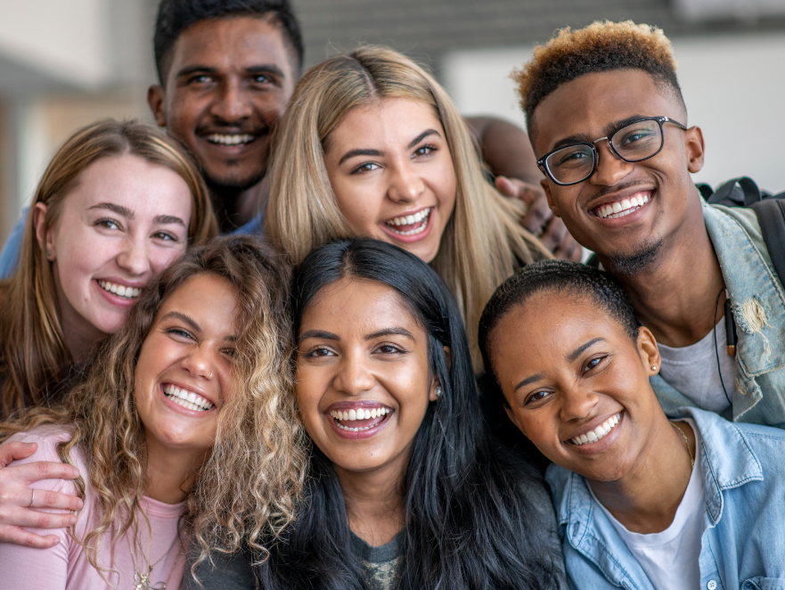 Students smile in the classroom