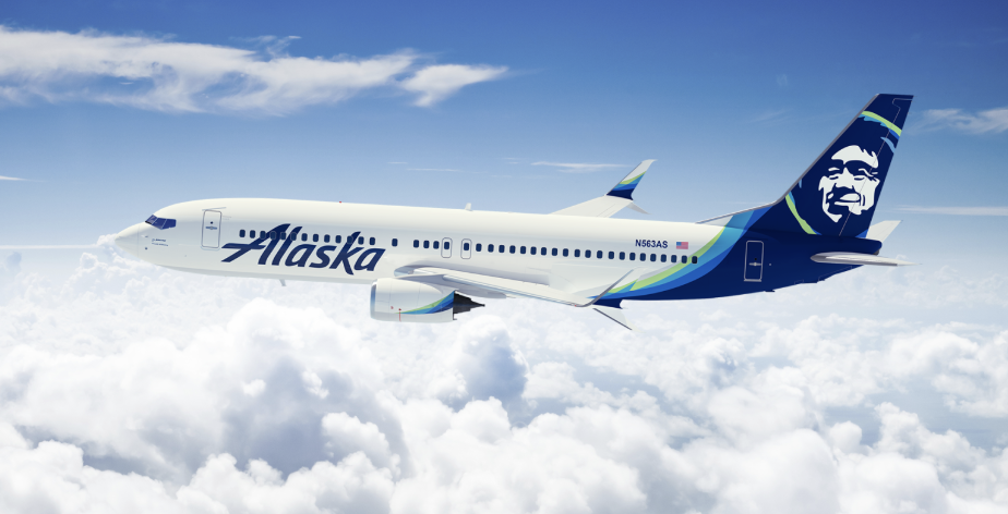 Alaska Airlines 737 flying above the clouds