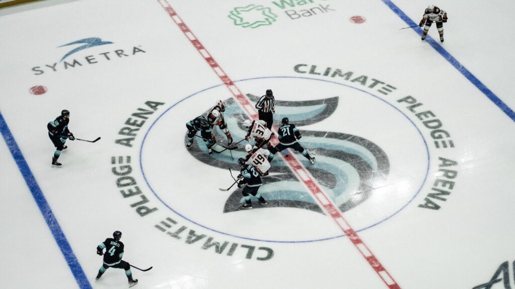 Seattle Kraken players playing hockey