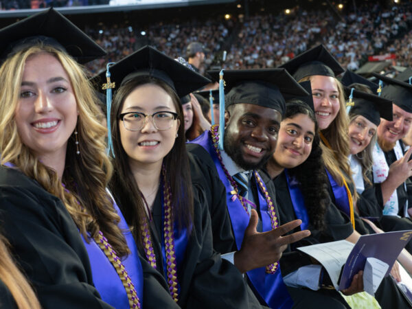 People in graduation regalia. 