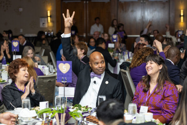 An event where people are sitting at tables. 