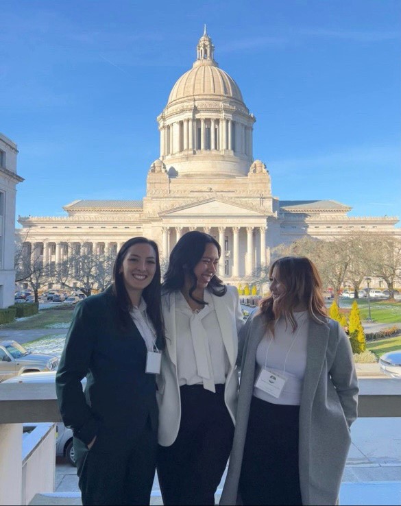 Three women in front of Washington State Capital