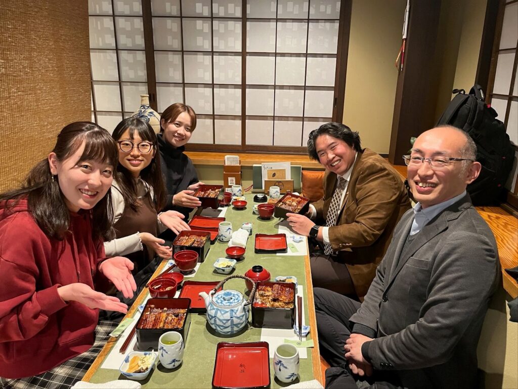 Dr. Niitsu and colleagues having a meal