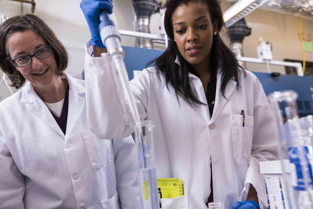 UW Bothell students work in a micro biology lab prepping samples taken from water around campus.