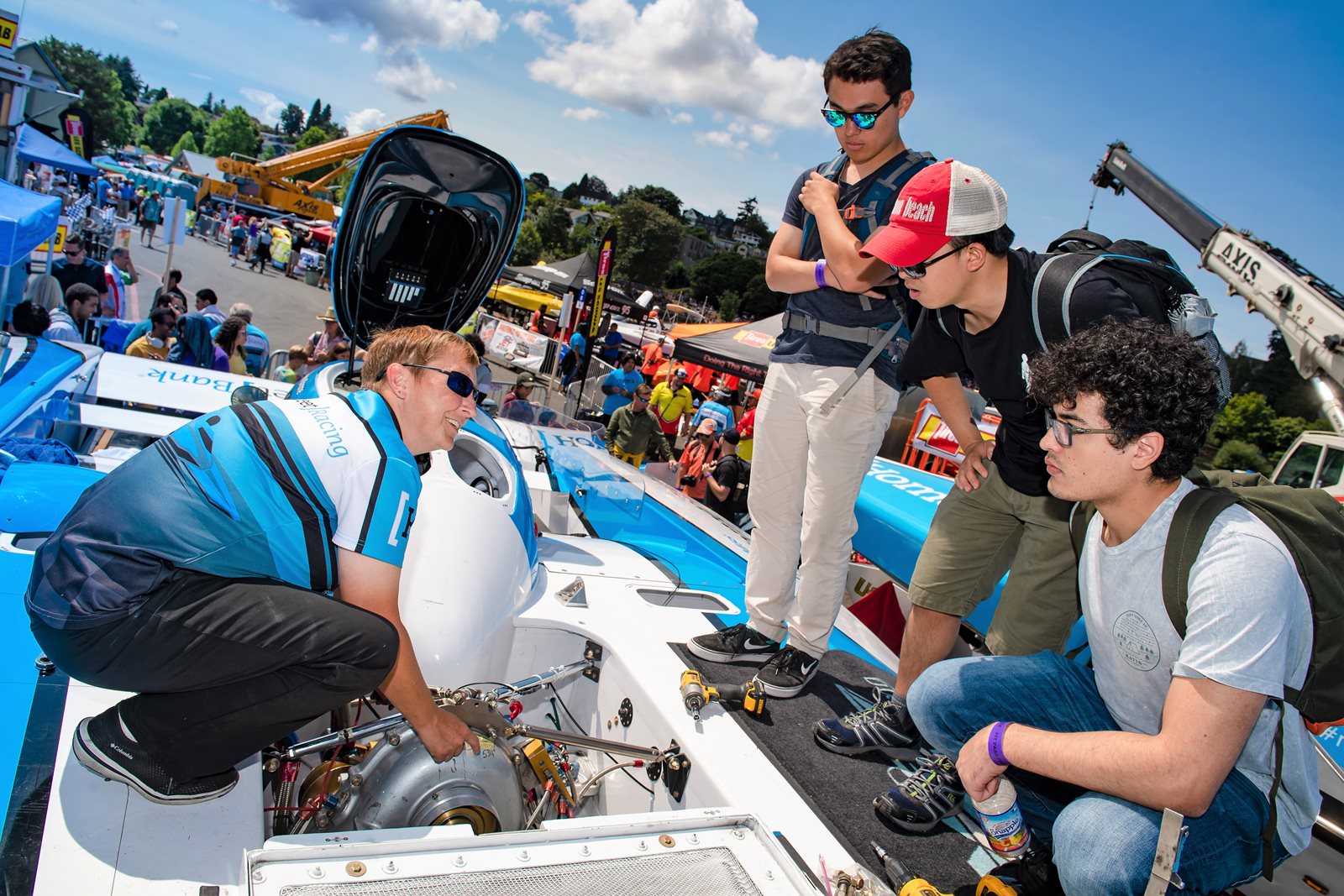 Cindy Shirley shows boat to students