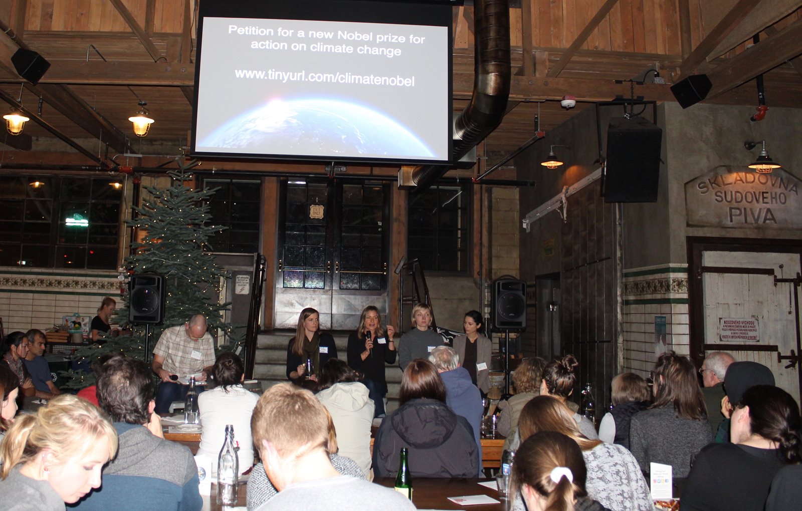 Climate Science on Tap event showing panel