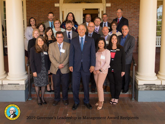 Photo of Governor Inslee with awardees