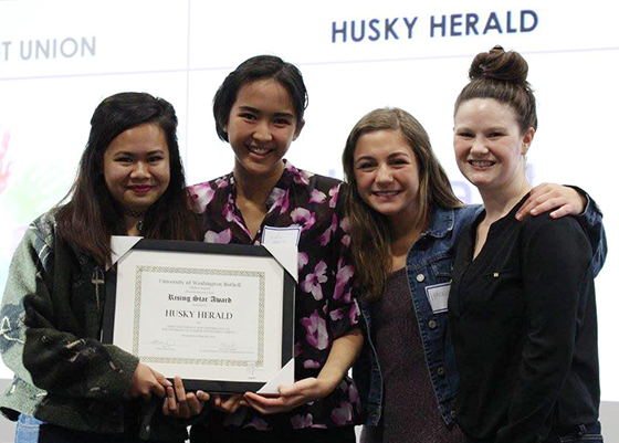 photo of Husky Herald members with award