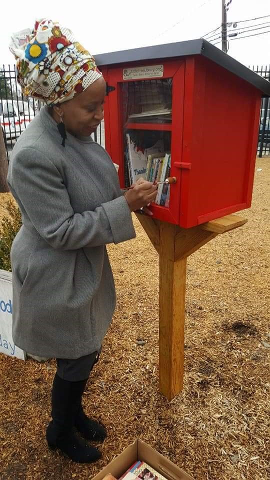 Talena Lachelle Queen at a free community book share